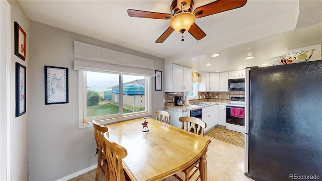4160 Converse Rd, Bennett, CO 80102 - dining space with ceiling fan and recessed lighting