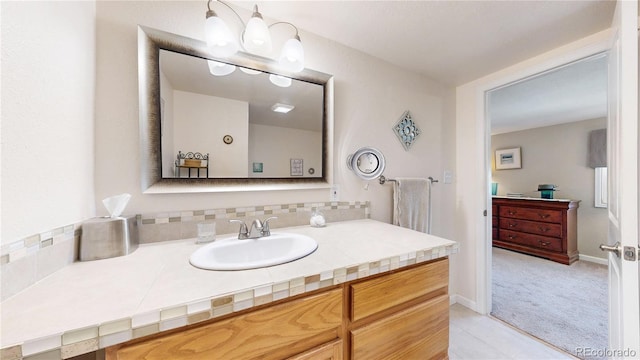 4160 Converse Rd, Bennett, CO 80102 - bathroom with vanity, backsplash, and tile patterned flooring