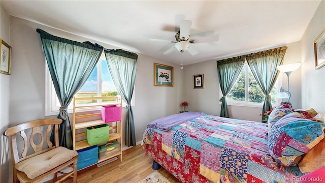 4160 Converse Rd, Bennett, CO 80102 - bedroom featuring wood finished floors and ceiling fan