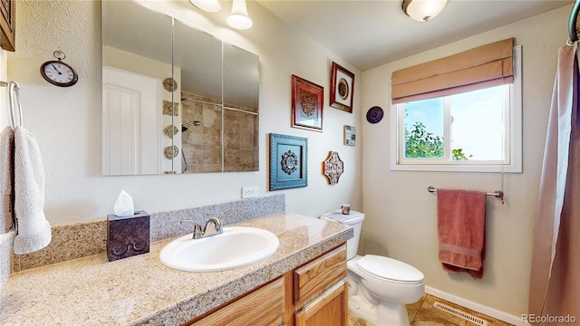 4160 Converse Rd, Bennett, CO 80102 - full bathroom featuring vanity and tiled shower