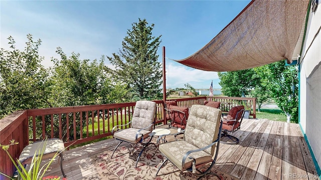 4160 Converse Rd, Bennett, CO 80102 - wooden terrace featuring outdoor dining area