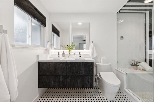 8612 W 69th Pl, Arvada, CO 80004 - bathroom with double vanity and tiled shower