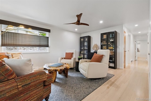 8612 W 69th Pl, Arvada, CO 80004 - living room with wood finished floors, recessed lighting, and a ceiling fan