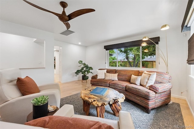8612 W 69th Pl, Arvada, CO 80004 - living area with ceiling fan and wood finished floors