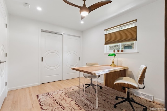 8612 W 69th Pl, Arvada, CO 80004 - home office with light wood-style floors, a ceiling fan, and recessed lighting