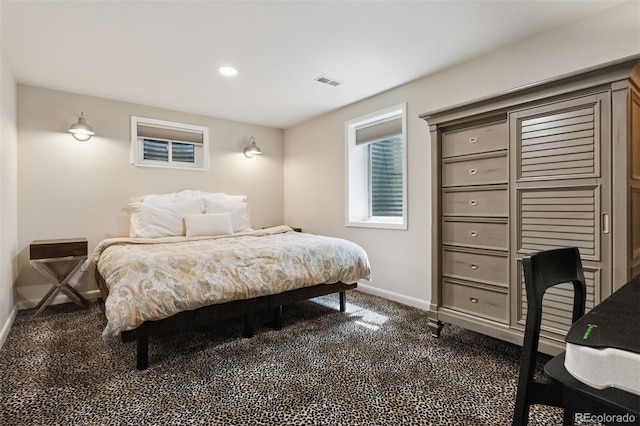 8612 W 69th Pl, Arvada, CO 80004 - bedroom featuring dark colored carpet and recessed lighting
