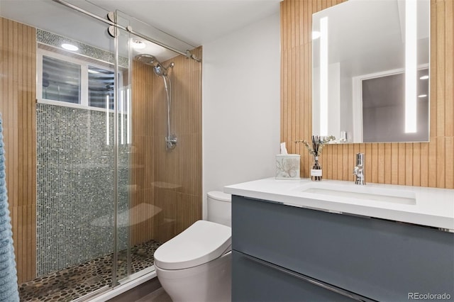 8612 W 69th Pl, Arvada, CO 80004 - bathroom featuring vanity and a shower stall