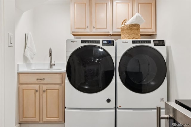 8612 W 69th Pl, Arvada, CO 80004 - laundry room with separate washer and dryer and cabinet space
