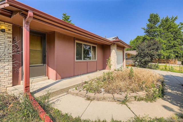 12576 W 7th Ave, Lakewood, CO 80401 - view of side of property featuring a garage