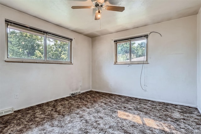 12576 W 7th Ave, Lakewood, CO 80401 - carpeted empty room with healthy amount of natural light and ceiling fan