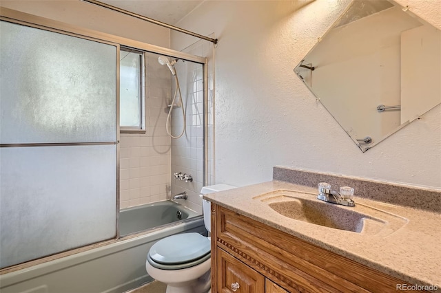 12576 W 7th Ave, Lakewood, CO 80401 - full bathroom featuring vanity, a textured wall, and bath / shower combo with glass door
