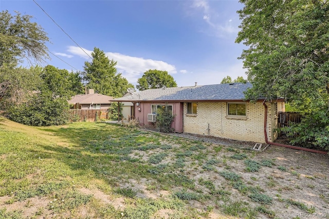 12576 W 7th Ave, Lakewood, CO 80401 - back of house with brick siding and a shingled roof