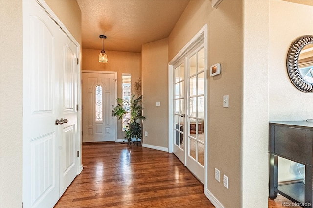 2459 Delicato Ct, Colorado Springs, CO 80921 - entryway with wood finished floors and baseboards