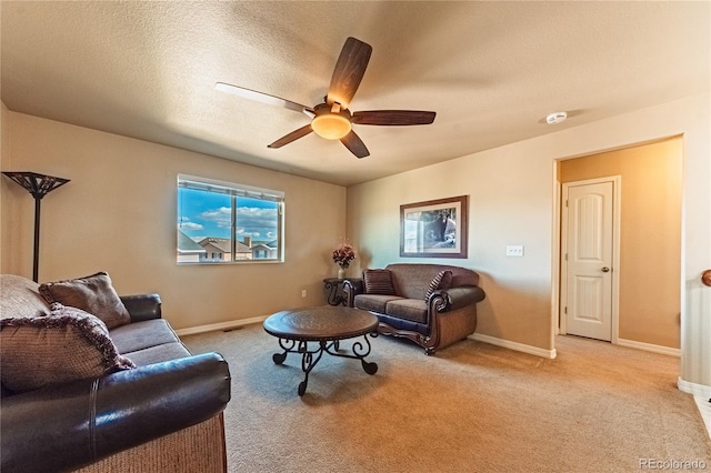 2459 Delicato Ct, Colorado Springs, CO 80921 - living area with ceiling fan, light carpet, and baseboards
