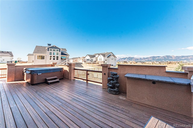2459 Delicato Ct, Colorado Springs, CO 80921 - wooden terrace featuring a hot tub, a residential view, and a mountain view