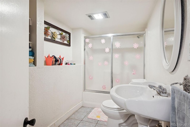 2865 Newland St, Wheat Ridge, CO 80214 - bathroom with tile patterned flooring and toilet