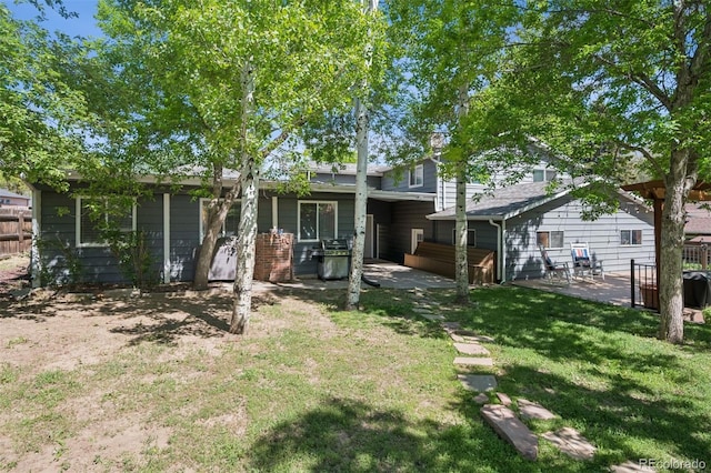 2865 Newland St, Wheat Ridge, CO 80214 - back of house featuring a patio