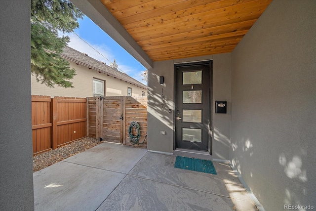 entrance to property featuring a patio area