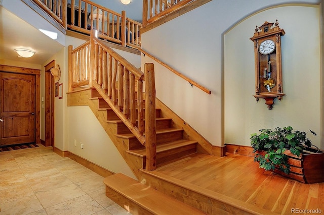 stairway with a high ceiling