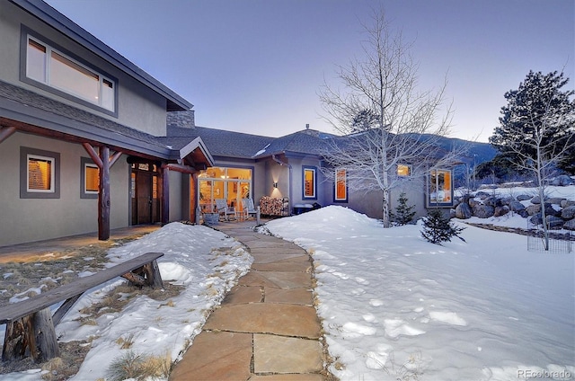 view of front of property with a mountain view