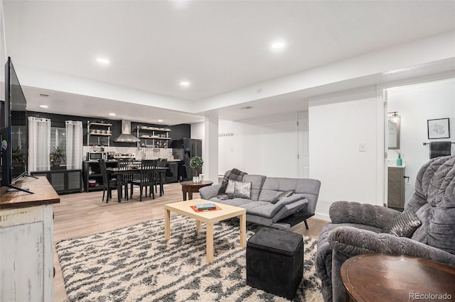15776 E 107th Way, Commerce City, CO 80022 - living room featuring light wood-style flooring and recessed lighting