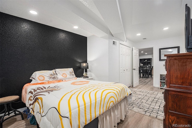 15776 E 107th Way, Commerce City, CO 80022 - bedroom featuring wood finished floors and recessed lighting