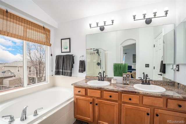 15776 E 107th Way, Commerce City, CO 80022 - full bathroom featuring a stall shower, a bath, double vanity, ensuite bathroom, and vaulted ceiling