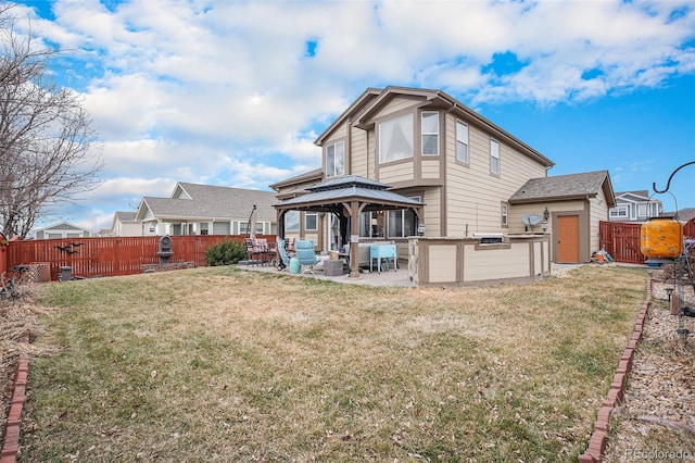 15776 E 107th Way, Commerce City, CO 80022 - back of house with a gazebo and a patio