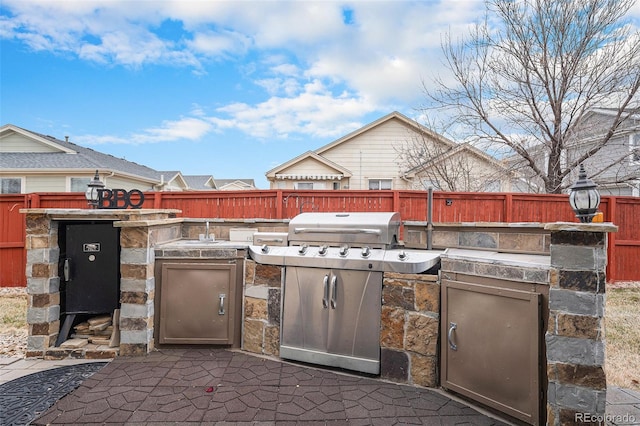 15776 E 107th Way, Commerce City, CO 80022 - fenced backyard featuring a patio