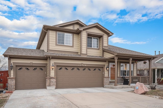 15776 E 107th Way, Commerce City, CO 80022 - view of front of home featuring covered porch, concrete driveway, brick siding, and an attached garage