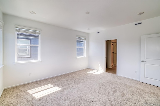 view of carpeted spare room