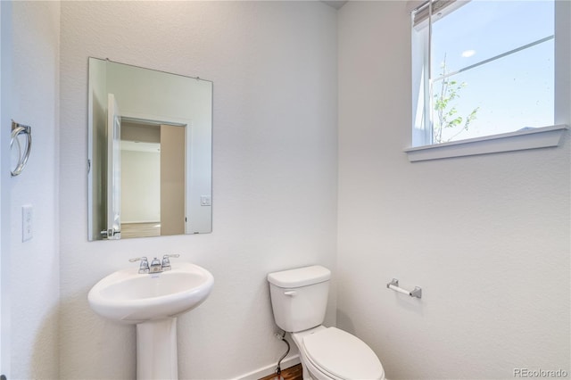 bathroom featuring toilet