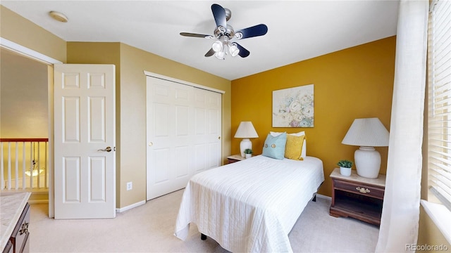 13307 Humboldt Dr, Thornton, CO 80241 - bedroom with light colored carpet, a closet, baseboards, and a ceiling fan