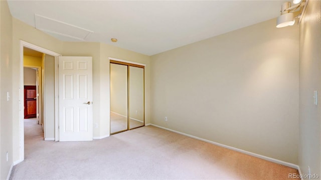 13307 Humboldt Dr, Thornton, CO 80241 - unfurnished bedroom featuring carpet floors, attic access, a closet, and baseboards