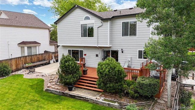 13307 Humboldt Dr, Thornton, CO 80241 - rear view of house with a deck