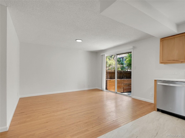 3061 W 92nd Ave Unit 14A, Westminster, CO 80031 - unfurnished dining area featuring a textured ceiling, light wood-style floors, and recessed lighting