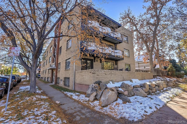 view of snow covered property