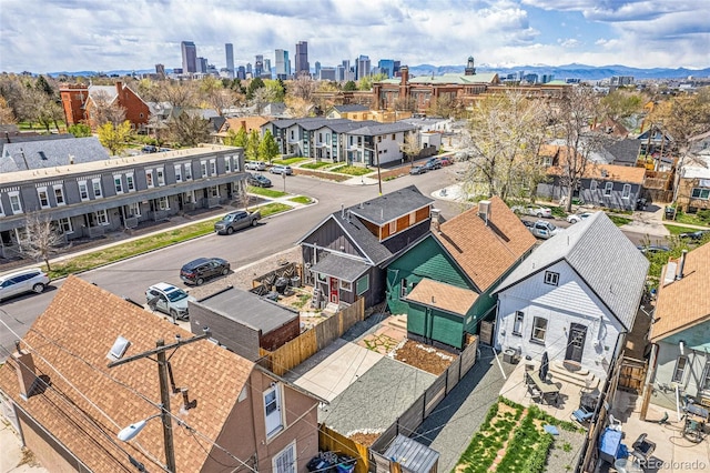 aerial perspective of suburban area featuring mountains and a skyline view