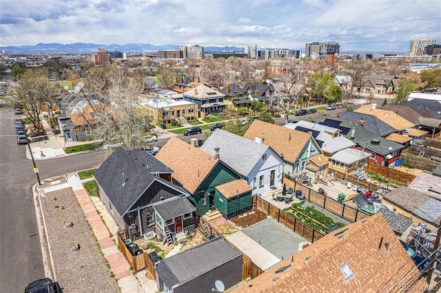 view of urban area featuring a mountain backdrop