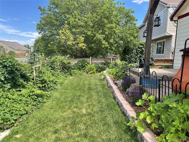 view of yard with fence