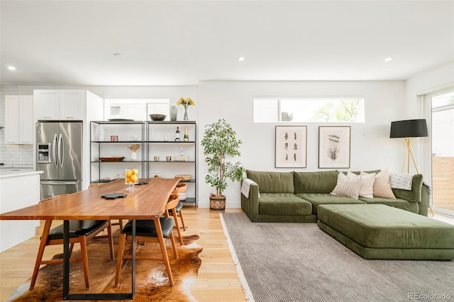 3957 Utica St, Denver, CO 80212 - living area with light wood-style floors and recessed lighting