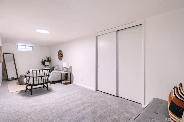 sitting room with light colored carpet