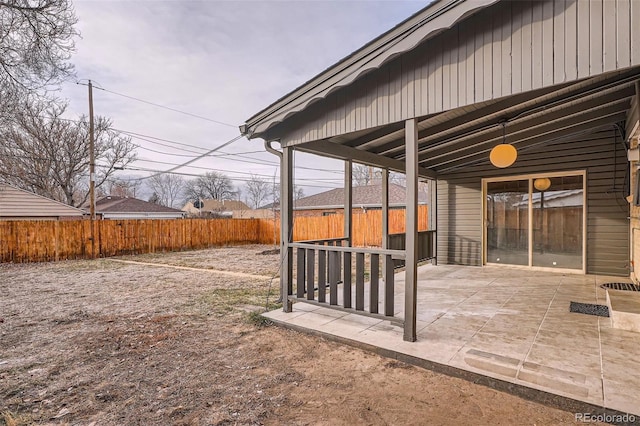 view of yard with a fenced backyard and a patio