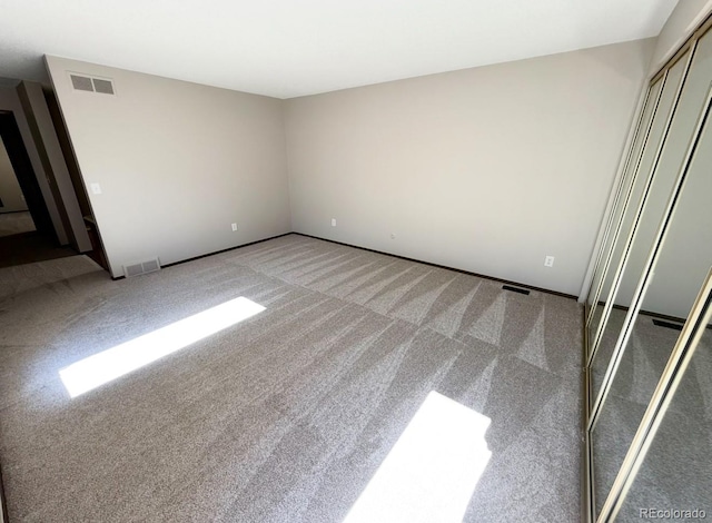 53 Douglas Dr S, Broomfield, CO 80020 - carpeted spare room featuring baseboards