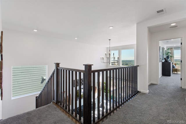 13326 Blue Amber Ct, Parker, CO 80134 - corridor with a chandelier, carpet, healthy amount of natural light, an upstairs landing, and recessed lighting
