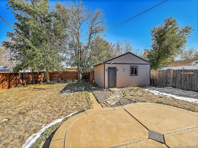 back of property with an outbuilding