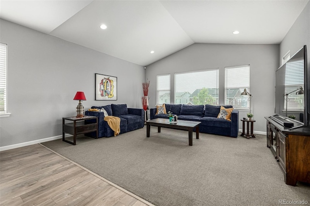 9406 Bross St, Arvada, CO 80007 - living area featuring lofted ceiling, light wood-type flooring, and recessed lighting