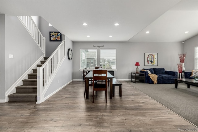 9406 Bross St, Arvada, CO 80007 - dining area with recessed lighting, stairs, and wood finished floors