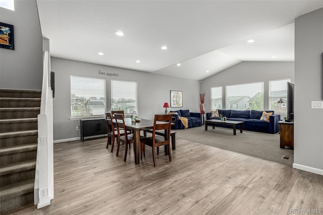 9406 Bross St, Arvada, CO 80007 - dining space with stairs, light wood-type flooring, lofted ceiling, and recessed lighting