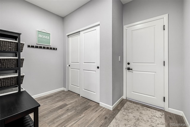 9406 Bross St, Arvada, CO 80007 - entrance foyer featuring wood finished floors